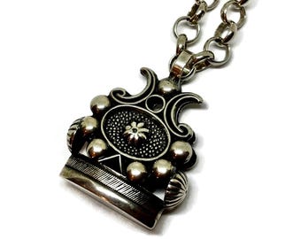 Fob seal pendant with 80 cm chain. Hallmarked silver from The Netherlands.