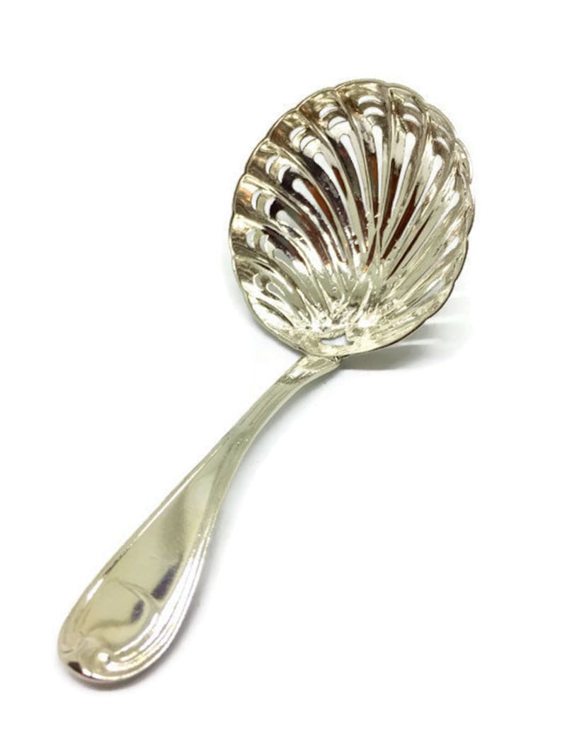 silver sugar sifter spoon