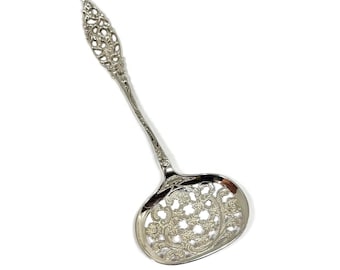 Rococo Wet fruit spoon.  With pierced bowl and Rococo handle. Dutch silver hallmarked ca. 1930