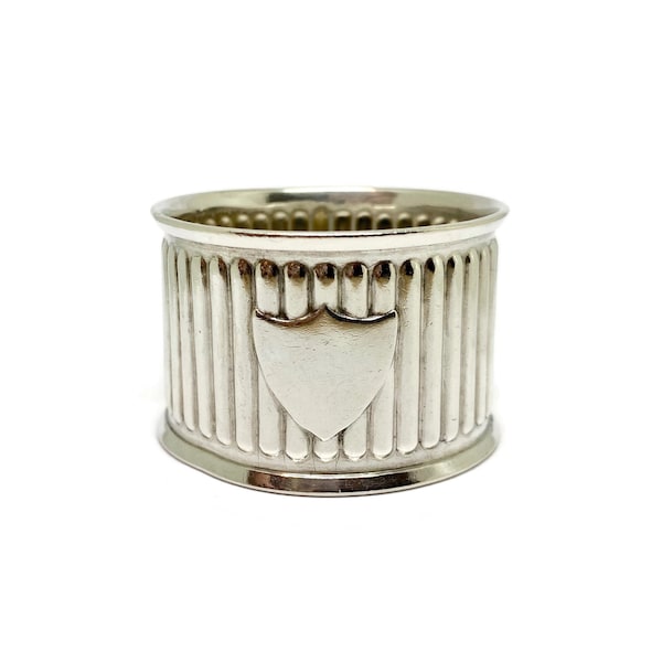 Silver Napkin ring. With clear monogram shield at front. 830 silver