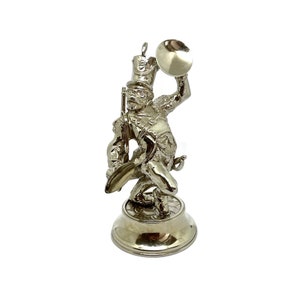 Silver marching band musician orchestra band figure statue with cymbals.