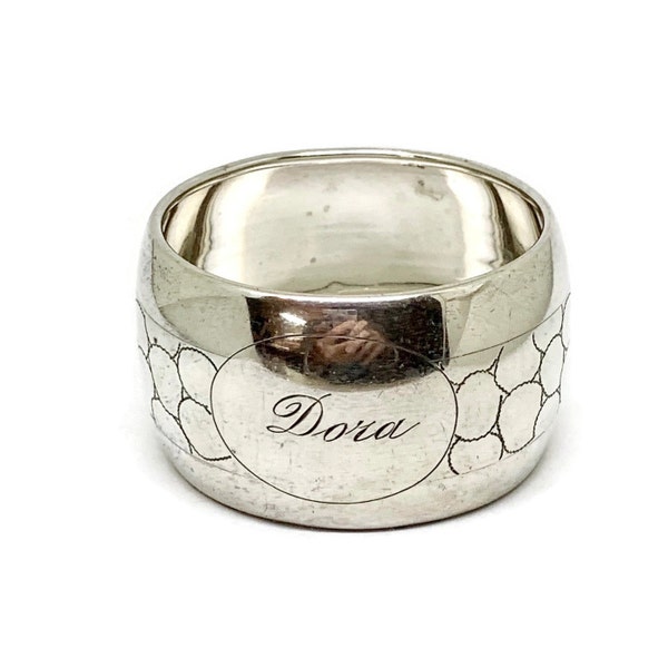 Vintage napkin ring. Engraved "Dora"  Silver hallmarked