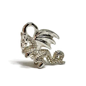 Silver dragon charm. Silver vintage 3D pendant.