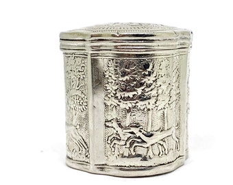Silver snuff box beautiful decorated  hunting scene, and milkmaid at bottom and cow at the top.