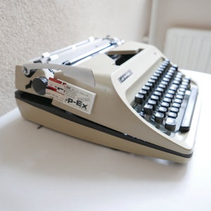 Triumpf Adler Sheidegger Germany Mechanical Typewriter in Beige with case 1960s image 6