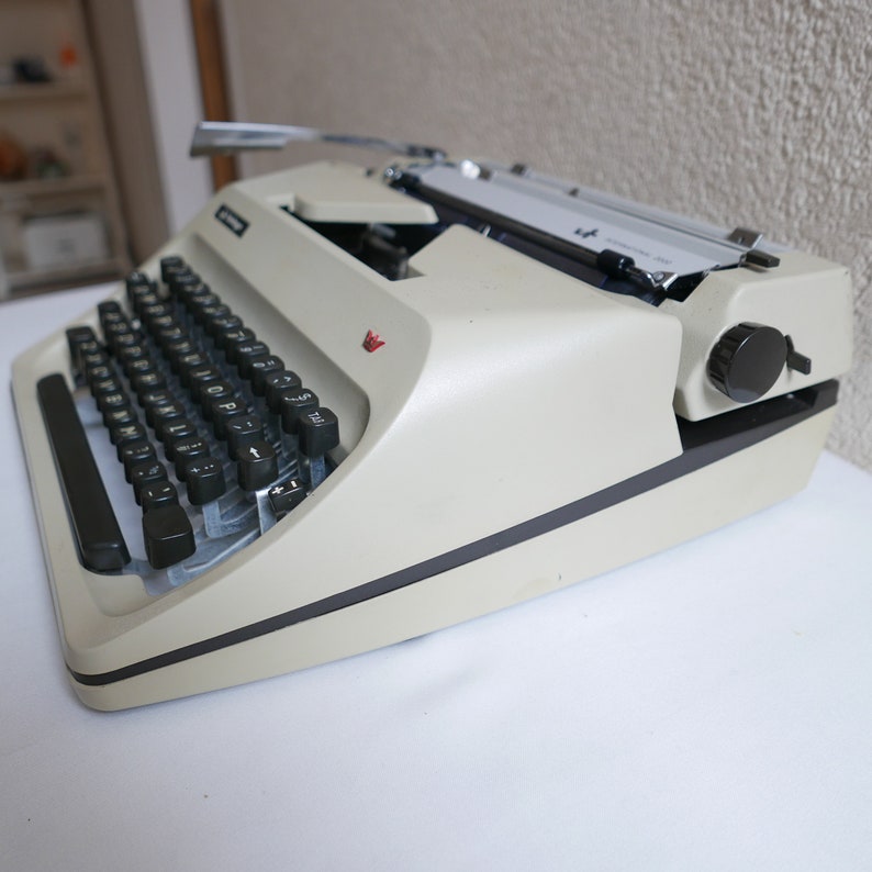 Triumpf Adler Sheidegger Germany Mechanical Typewriter in Beige with case 1960s image 5