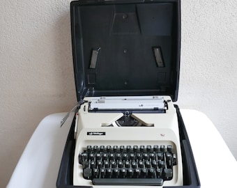 Triumpf Adler Sheidegger Germany Mechanical Typewriter in Beige with case - 1960s