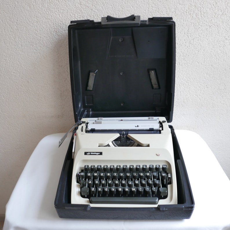 Triumpf Adler Sheidegger Germany Mechanical Typewriter in Beige with case 1960s image 1
