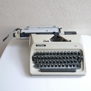 Triumpf Adler Sheidegger Germany Mechanical Typewriter in Beige with case 1960s image 2