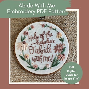 Peut inclure: Un cercle à broder avec la phrase "Help of the helpless, Abide with me!" brodée en fil marron, entourée de fleurs roses, pêche et vertes. Le texte "Abide With Me Embroidery PDF Pattern" est en haut. Guide numérique pour cerceaux de 12,7 à 20,3 cm.