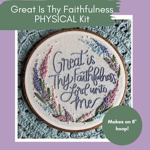 May include: An embroidery kit featuring the text "Great Is Thy Faithfulness" in blue script, encircled by floral embroidery in pink, purple, and blue. The kit makes a 20 cm hoop.