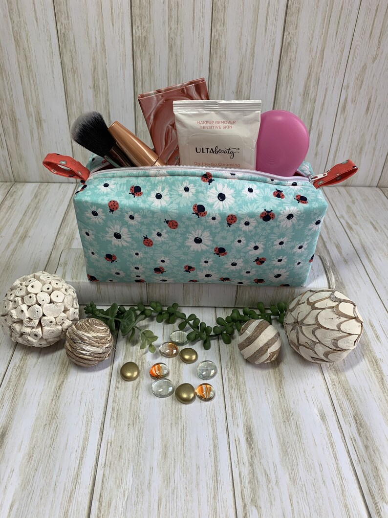 Travel Bags Lucky Delicate Aqua and Salmon Ladybug and Daisy Insects Flowers Meadow Blossom Stylized