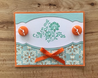 Get Well Soon Card: layered paper, hand stamped image with pearls, 2 buttons with string, and ribbon bow