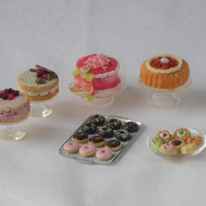 Cakes on a glass stand and other Desserts