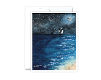 May include: Watercolor painting of a sailboat on the ocean under a starry night sky and a full moon. The water is a deep blue with white reflections. The card is white with a white border.