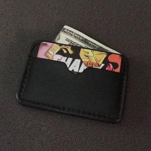 Cartera minimalista de cuero negro