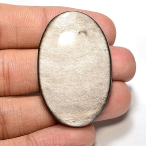 Cabochon en obsidienne argentée...Cabochon ovale...41x27x6mm...49Cts...#i2971
