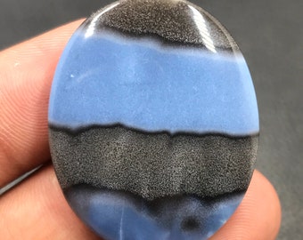 Cabochon bleu opale...Cabochon ovale...35x29x5 mm...43 carats...A#M4830
