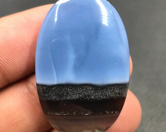 Cabochon bleu opale...Cabochon ovale...37x24x6 mm...42 Cts...A#M4832