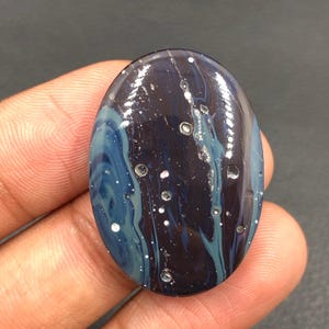 Leland Blue Cabochon... Oval Cabochon...32x23x6 mm...39 Cts...A#N1007