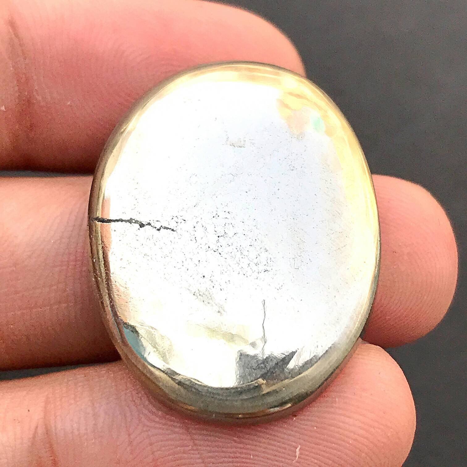 Apache Pyrite Cabochonoval Cabochon31x23x5 Mm..55 Cts