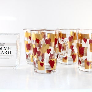 Holmegaard -  4 lovely vintage Christmas drink glass with gold and red hearts - Made in Denmark 1990.