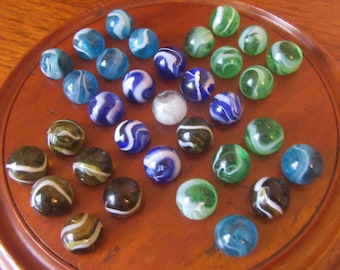 Antique c1900s hardwood solitaire board with 33 hand blown glass marbles. Handmade board and marbles.