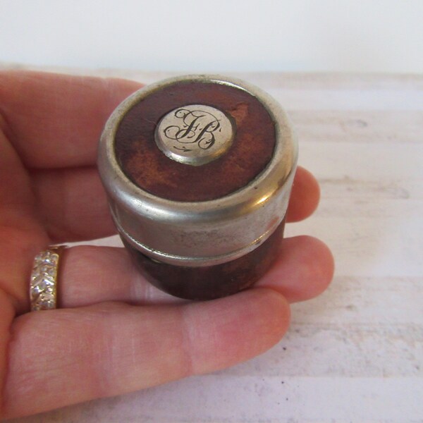 Antique Victorian travel inkwell. Silver tone metal and leather hinged lid collectible inkwell.