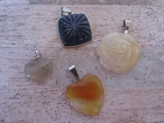Choice of 4 x gemstone pendants. Creamy/white flo… - image 1