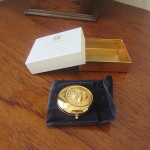 Estee Lauder compact. Golden Aquarius Lucidity boxed as new unused.
