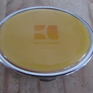 Vintage Boss Orange silver-tone metal chrome plated oval shaped handbag, pocket double mirror compact.