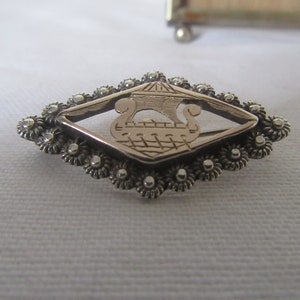 Antique Rare Victorian silver brooch Viking ship. unmarked tested silver, marked 23.30 unknown mark..