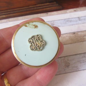 Vintage Estee Lauder enamel gold-tone/brass mini compact. Made in U.S.A.