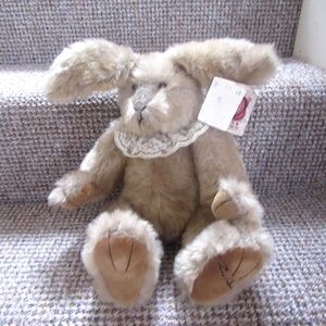 Vintage Russ Berrie Buckingham bunny. with Limited Edition tag. Buckingham Russ body tag.## wear on one paw.