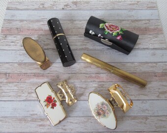 Vintage Stratton lipview lipstick holder. Caron perfume wand. red roses lipstick holder, lipstick cases, empty perfume spray.All 6 items.