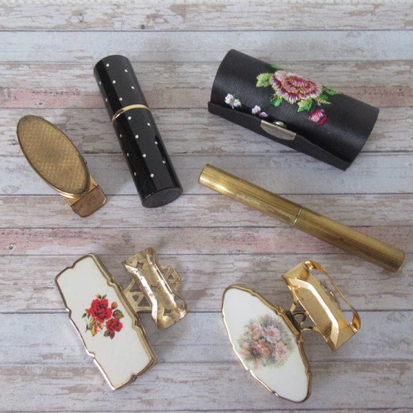 Vintage Stratton lipview lipstick holder. Caron perfume wand. red roses lipstick holder, lipstick cases, empty perfume spray.All 6 items.