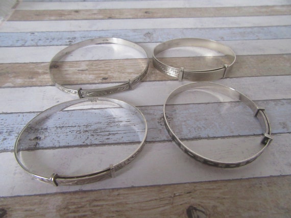 Choice of 4 silver adjustable bangles, bracelets.… - image 2