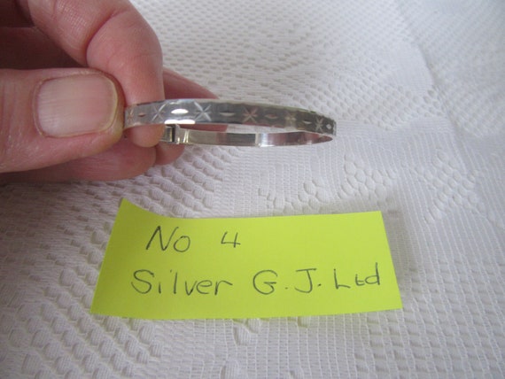 Choice of 4 silver adjustable bangles, bracelets.… - image 10
