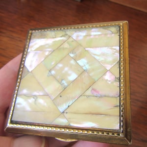 Rare Vintage Mother of pearl &quot;Melissa&quot; powder compact.  Made In England. Square gilt gold-tone case.