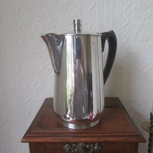 Antique English c1900s silver plated coffee pot. Bakelite handle. Hot water jug. Tea pot. .LR E.P.N.S. A1.  Lewis Rose & Co. Sheffield.