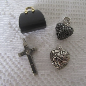 Vintage pendants.Choose from 4.Black acrylic handbag goldtone handle.Silvertone metal heart.Crucifix,cross.Black diamontes silvertone heart.