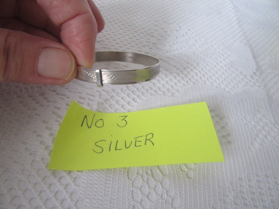 Choice of 4 silver adjustable bangles, bracelets.… - image 8