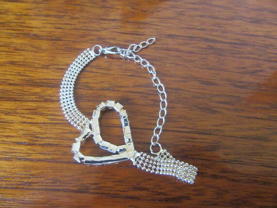 Silver & silvertone bracelets/bangle. Choice of 4… - image 10