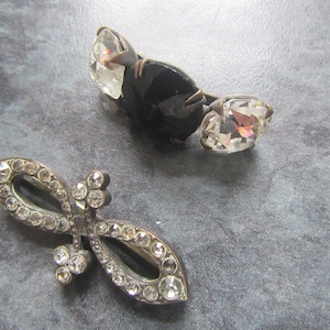 May include: A rustic wooden sign with the text "Welcome to our home" in white lettering. The sign features a distressed finish and a simple, inviting design, perfect for entryway decor.