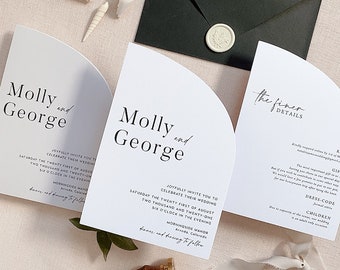 May include: A white wedding invitation with a half-circle design. The invitation reads "Molly and George" and includes the wedding date and time. The invitation is on a beige background with a black envelope and a wax seal.