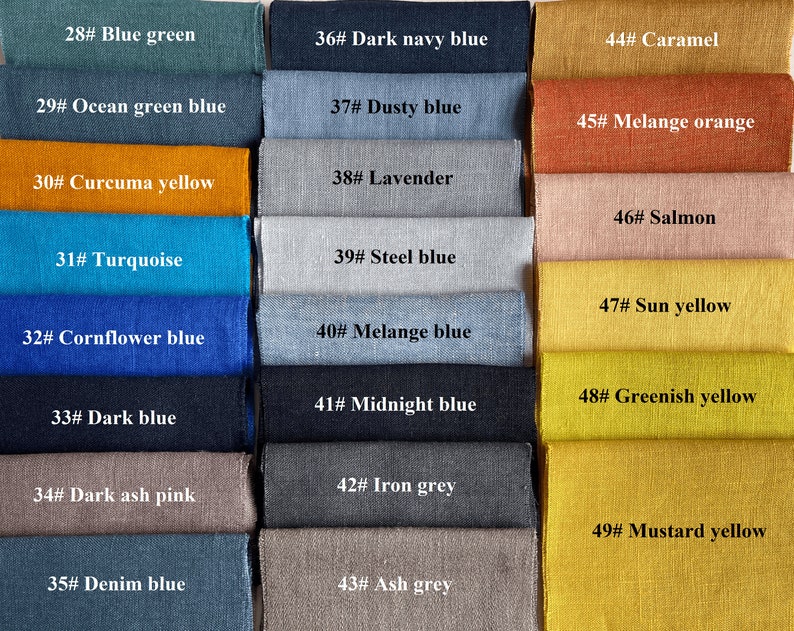 May include: A color chart of 21 fabric swatches with corresponding numbers and color names. The swatches are arranged in three columns and seven rows. The colors range from blue green to mustard yellow.