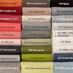 May include: A swatch card with 27 different fabric samples, each labeled with a number and a color description. The colors range from burnt orange to dusty aqua green, and include shades of red, pink, grey, green, and white.