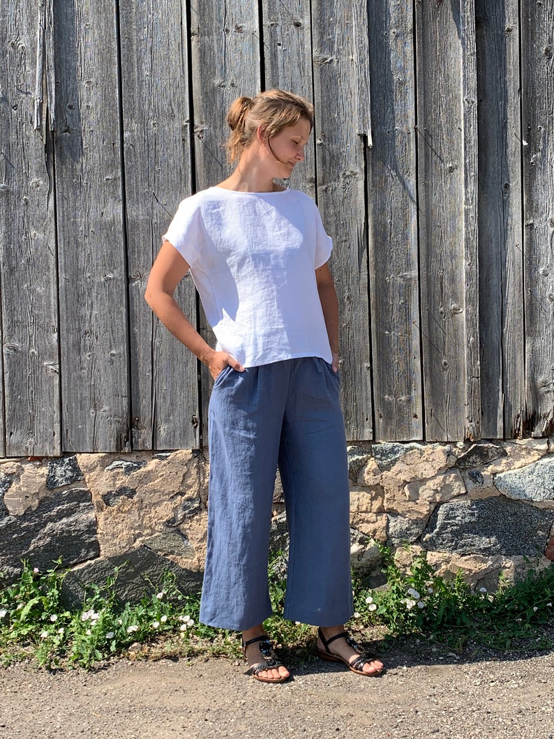Loose-fitting linen pants for women in a relaxed wide-leg style, perfect for summer.