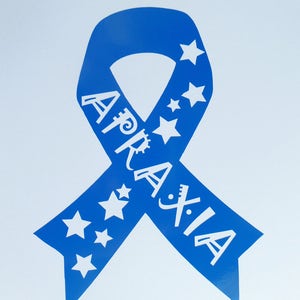 May include: A blue ribbon with white stars and the word "Ataxia" written on it.