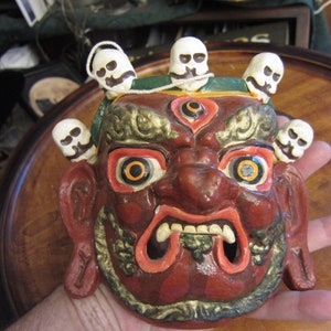 Paper Mache Tribal Face With Sculls